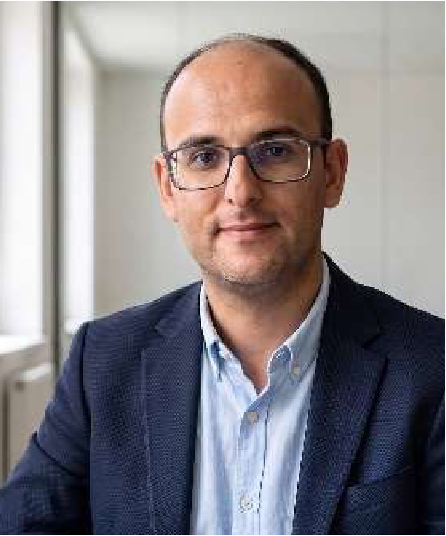 Dr Hassen Challouf